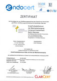 Zertifikat der D.A.F. Deutsche Assoziation für Fuß und Sprunggelenk e.V. mit Text, grafischen Logos und Unterschriften für das Zentrum der Maximalversorgung für Fuß- und Sprunggelenkchirurgie der Klinik für Orthopädie und Unfallchirugie am Immanuel Krankenhaus Berlin in Berlin-Wannsee.